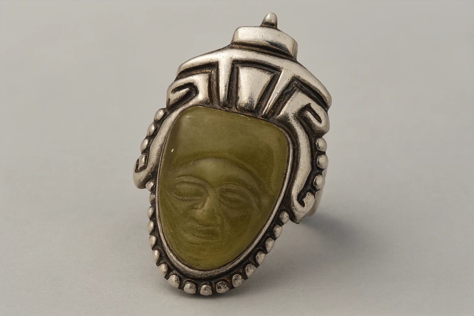 Los Castillo Ring with Green Onyx Mask and Futuristic Headdress