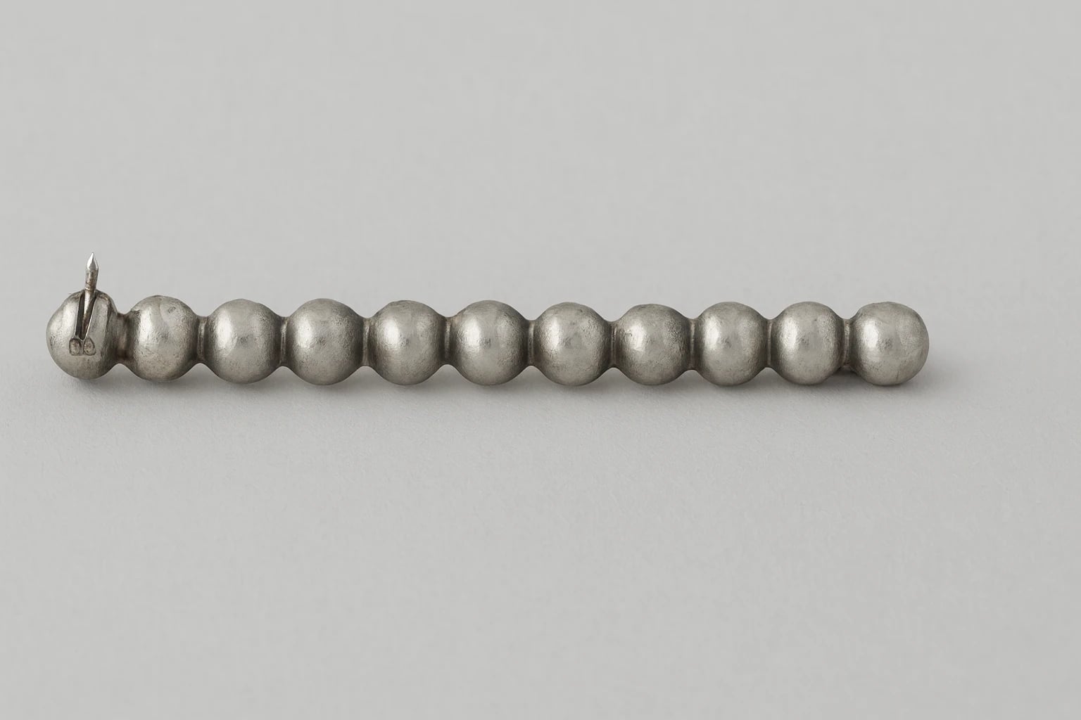 William Spratling Twelve Half Ball Bar Brooch